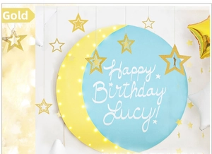 Close-up of sparkling hollow gold stars for birthday and Christmas party decoration