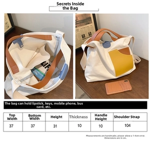 Detailed dimension chart showing size and handle length for large canvas tote bag