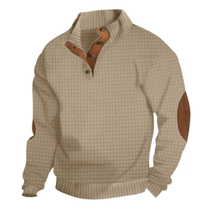 Detail of khaki waffle knit sweatshirt featuring stand collar with buttons and elbow patches