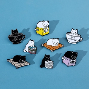 Detailed collection of eight cute enamel cat pins reading books and drinking coffee
