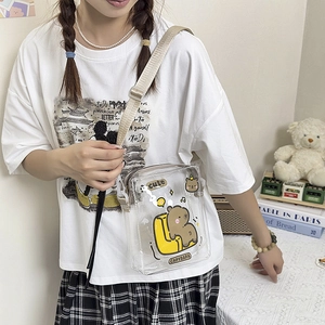 Detail of transparent PVC crossbody bag with cute cartoon capybara print and adjustable strap