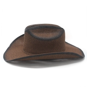 Detail of hand-woven dark brown western cowboy hat with vintage distressed black edges