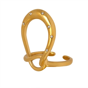 Golden geometric crown ring in 18k gold-plated titanium with sparkling zircons