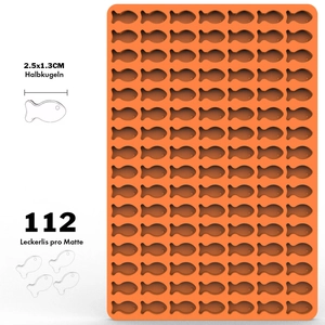 Detail view of 112-cavity fish-shaped silicone mold in orange for dog treats and chocolate