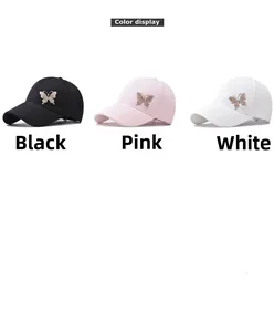 Detailed color display of cotton baseball caps in black, pink, and white with butterfly pins