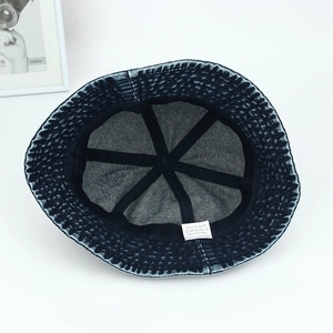 Retro denim bucket hat with 100% cotton lining and interior cross reinforcement tape