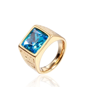 Men's vintage gold stainless steel ring with a large square blue gemstone on white background