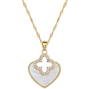 Luxurious gold heart pendant necklace with clover diamond inlay and mother of pearl finish