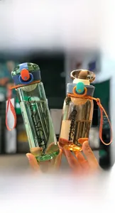 Detail showing leak-proof silicone seal and tea infuser inside a sports water bottle