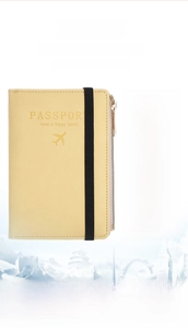 Detail of beige RFID leather passport holder showing lychee texture and gold zipper