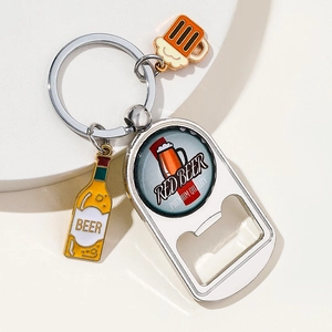 Detail of silver bottle opener keychain with beer motifs and miniature charms