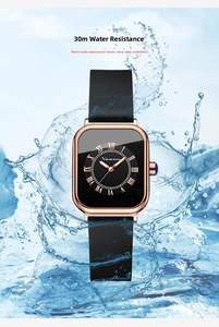 Macro shot of rose gold square watch with 30M waterproof rating and water splashes