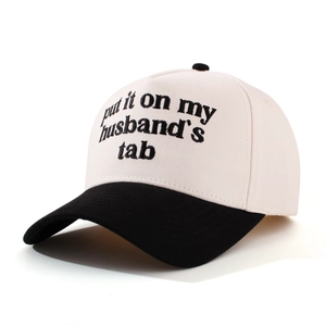 Close-up of contrast cotton baseball cap featuring high-quality black letter embroidery