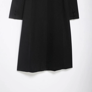 Classic black wool coat for women with premium textured fabric and elegant long silhouette