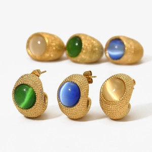 Elegant gold-plated cat eye stone earrings in green, blue, and cream on white background