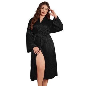 Elegant black silk satin robe with leopard jacquard pattern and a waist tie closure