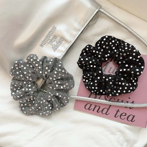 Sparkly sequin scrunchie and bow hair tie set in silver and black colors