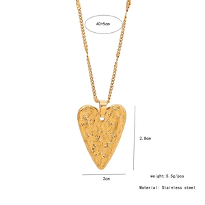 Detailed view of textured golden heart pendant with stainless steel chain specifications