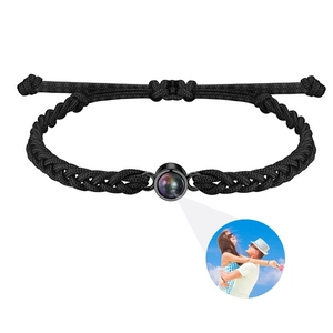 Detail of custom photo projection bracelet with black braided rope for Valentine gift