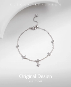 Macro view of S925 sterling silver four-leaf clover bracelet with zircon charms
