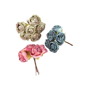Detail of vintage artificial silk rose bouquets in pink, blue, and green for DIY decor