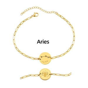 Detailed view of gold-plated Aries zodiac chain bracelet with engraved pendant.