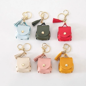 Mini PU leather earphone case with tassel and gold ring in six vibrant colors