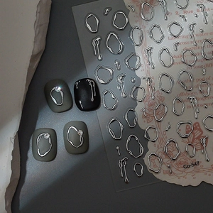 3D metallic silver liquid nail stickers with irregular fluid line designs on matte nails