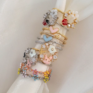 Colorful enamel floral and heart open rings with sparkling zircon pavé on silk stand