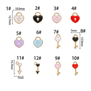 Size chart for heart lock and key alloy charms showing detailed width and height dimensions