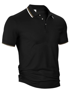 Men's black short sleeve polo shirt with white and orange tipped collar and cuffs