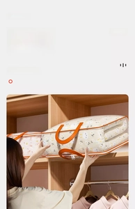 Detail of waterproof storage bag with orange handles being placed in a wooden closet