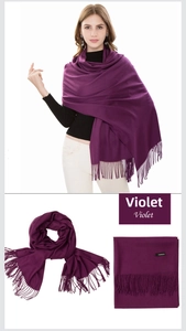 Close-up of violet cashmere scarf with soft brushed texture and fringed edges