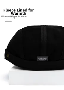 Detailed macro view of the thick warm fleece lining in this cotton polyester newsboy cap