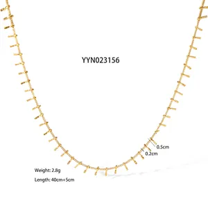 Detail of 18K gold plated stainless steel necklace featuring frosted texture bar pendants