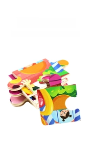 Close-up of thick wooden puzzle pieces with smooth edges and colorful cartoon designs