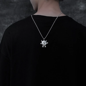 Hip hop monster pendant necklace in silver stainless steel shown on a model from the back