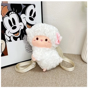 Detailed view of the cute white plush lamb crossbody bag with pink bow and beige strap