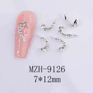 Detailed view of silver crescent tassel nail charms with rhinestones sized 7x12mm