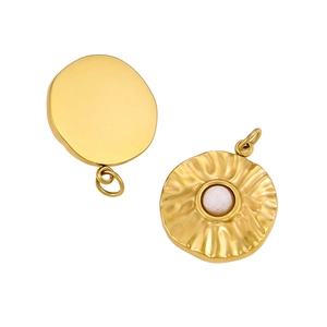 Macro view of gold-plated wavy circle pendant with white natural stone inlay detail