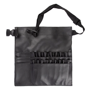 Detail of large black makeup brush organizer bag with multiple slots and strap
