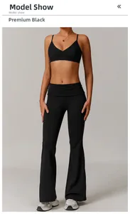 Detail view of premium black V-neck sports bra and high-waisted flare leggings set