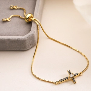 Elegant 18K gold plated cross pendant necklace featuring black and white heart zircon stones