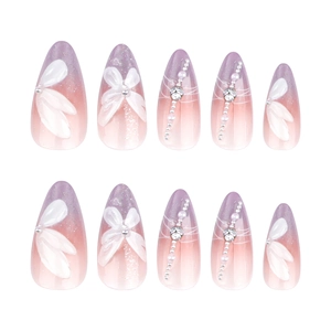 French purple cat eye gradient press-on nails with almond shape, pearls, and bows