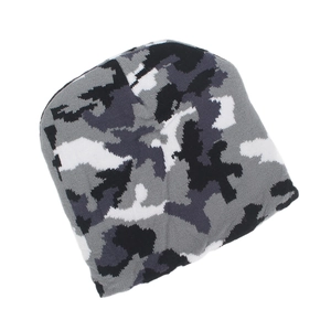Close-up of black and grey camouflage knit beanie showing stretch fabric and warm texture