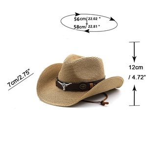 Detail of western straw cowboy hat with bull head ornament and adjustable chin strap