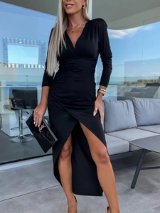 Elegant black long-sleeved dress with a deep V-neck and high side slit for evening wear