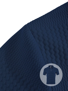 Detailed macro view showing the navy blue honeycomb textured fabric of this men's Polo shirt