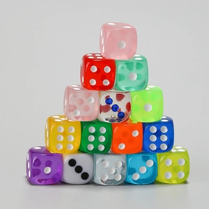 Colorful transparent resin dice set stacked in pyramid shape for DIY games
