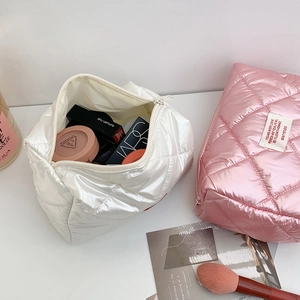 Quilted shiny pearl puffer cotton cosmetic bags in white and pink with diamond stitching